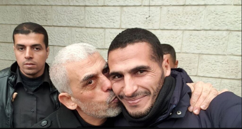 Who is Hassan Eslaiah? photographer in picture with Hamas commander Yahwa Sinwar?