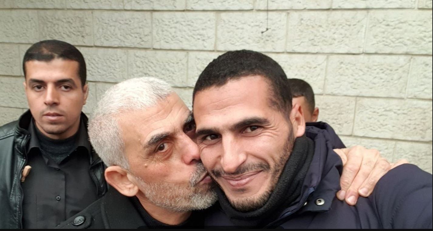 Who is Hassan Eslaiah? photographer in picture with Hamas commander Yahwa Sinwar?